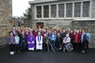 picture of Bishop Francis , Fr. Burke and members of Drumshanbo Community